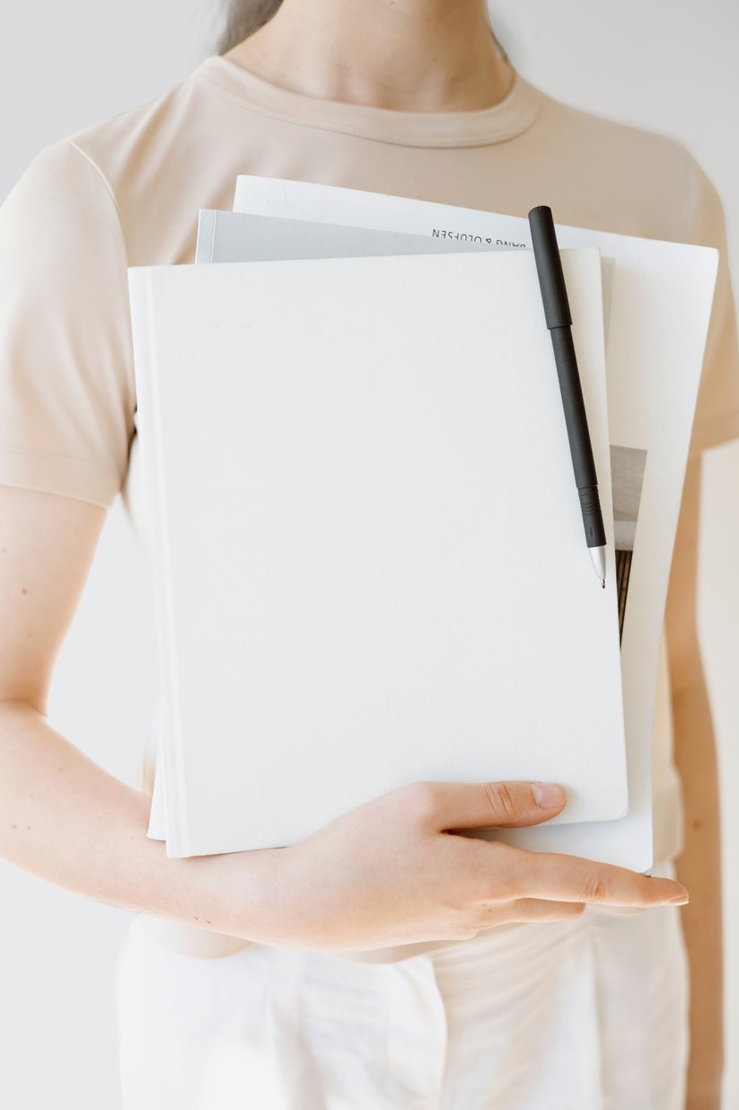 A Woman Holding Books